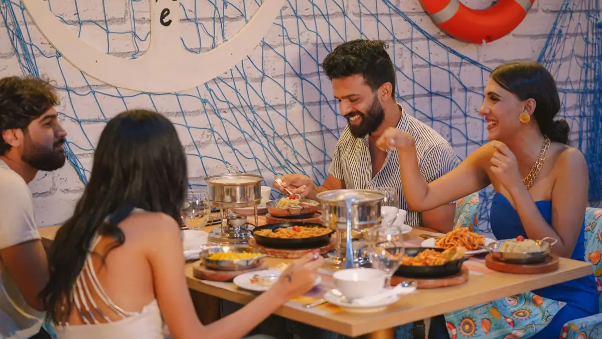 Group of friends sharing a seafood dinner